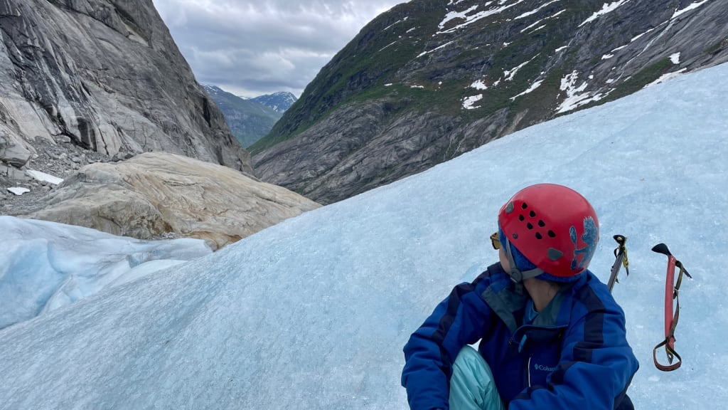 Admiring the fjord views from Jostedalsbreen Glacier between climbs