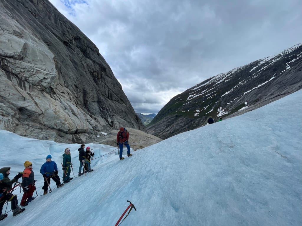 Glacier hikers walking across Jostedalsbreen Glacier in Norway