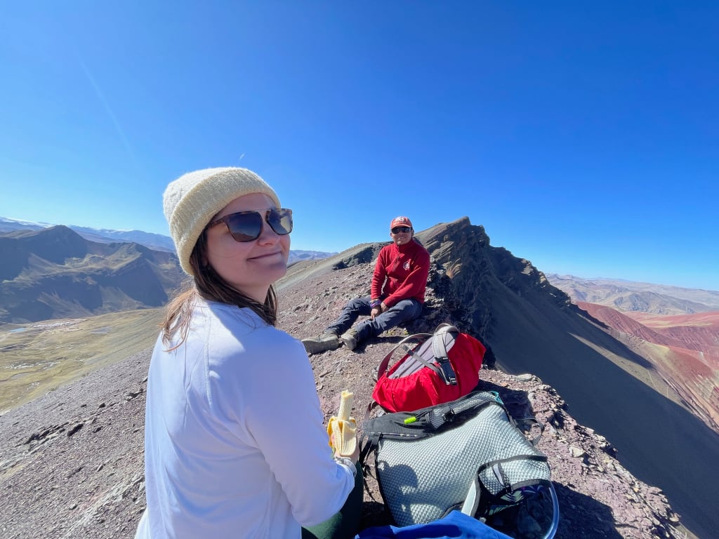 Sitting above the Red Valley near Rainbow Mountain