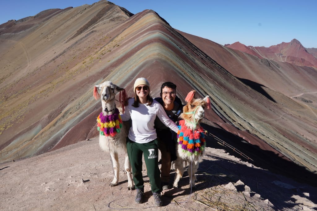 Kathryn with llamas at Rainbow Mountain in Peru