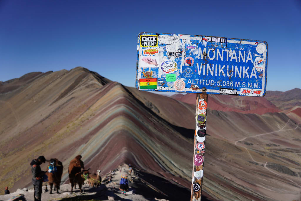 Altitude sign at Rainbow Mountain in Peru