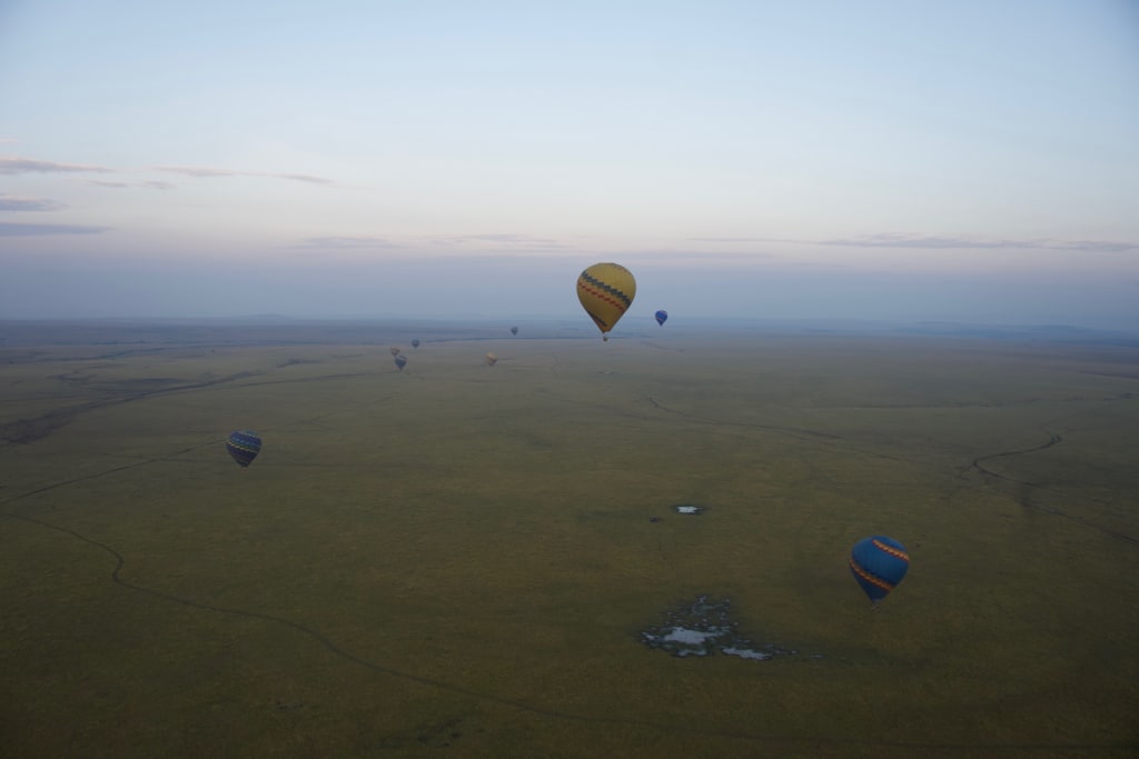 Colorful hot air balloon over Maasai Mara