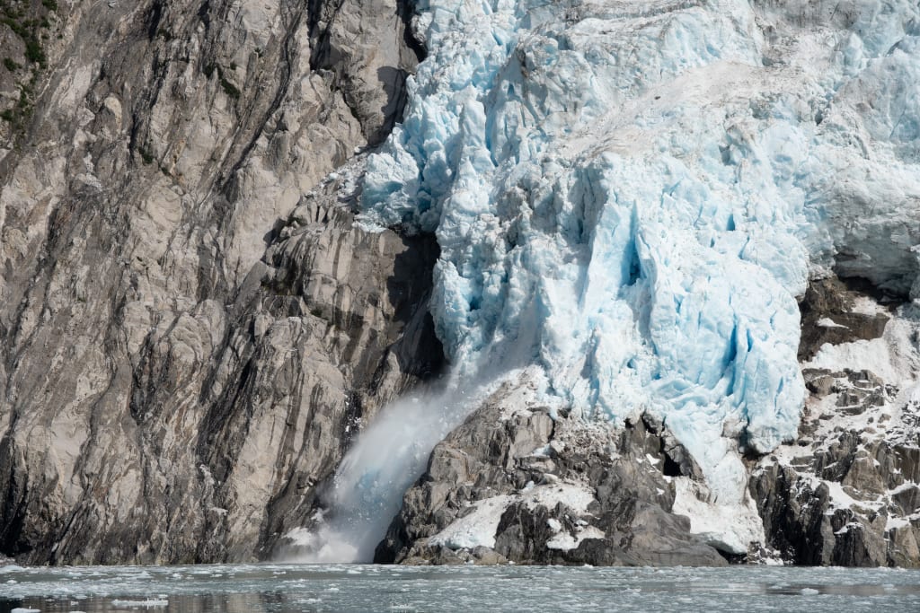 A chunk of ice calving from Northwestern Glacier