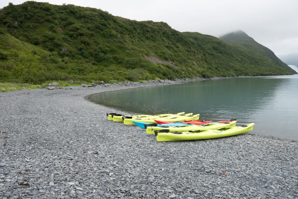 Kayaks waiting near Aialik Bay in Kenai Fjords National Park