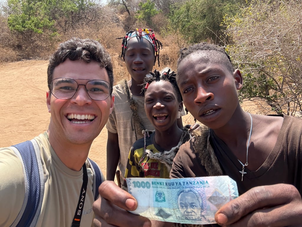 Giving the Hadzabe a tip after the experience