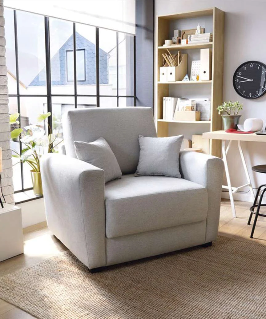 Abakus Direct Olly Single Sofa Bed in Grey standing in the center of the frame in a fully furnished sunlit room