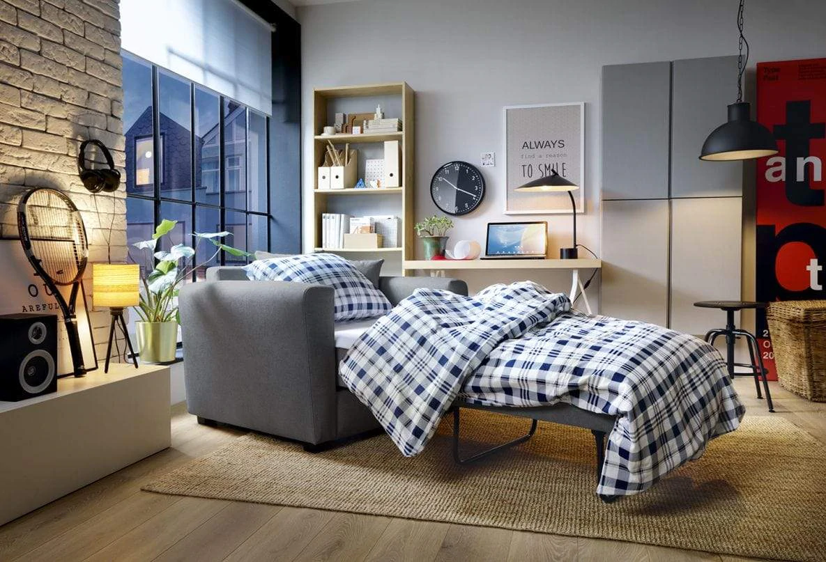 abakus direct olly single sofa bed in a furnished room ready to be slept on