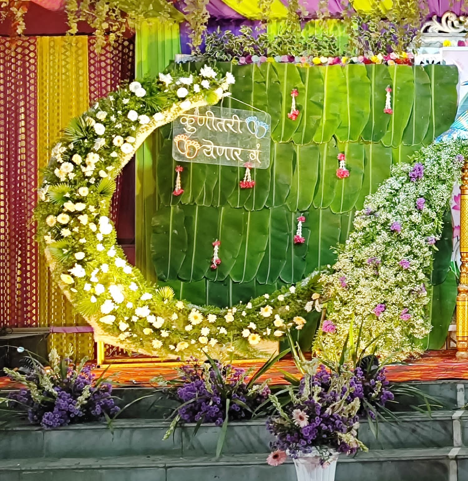 Traditional Krishna-Themed Baby Shower Stage with Peacock Swing & Floral Moon Ring