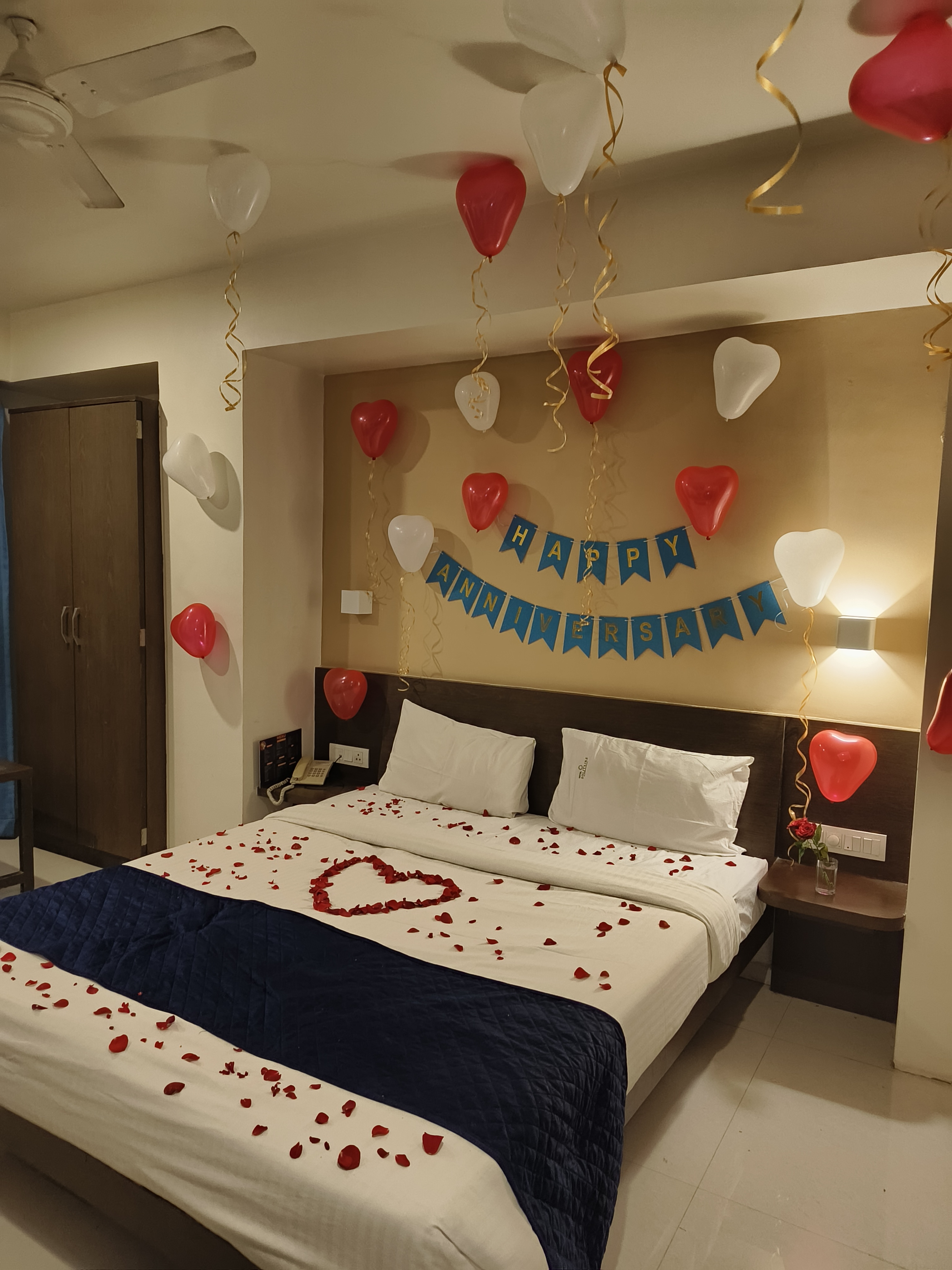 Romantic Anniversary Room Decoration with Balloons & Rose Petals
