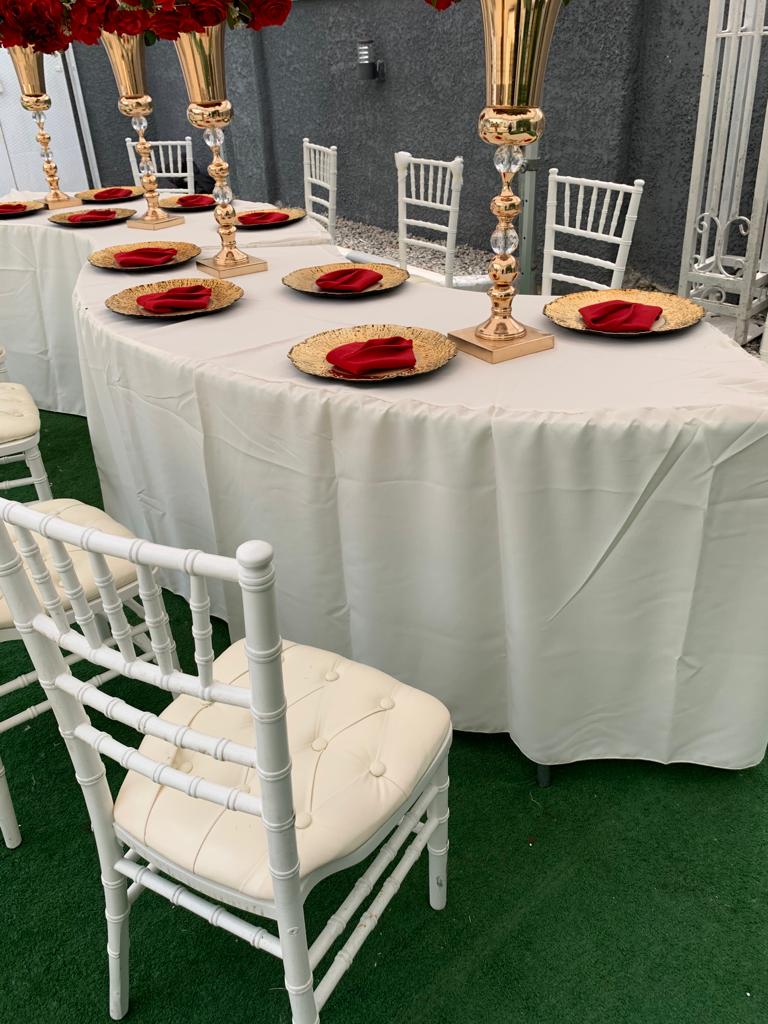 white chair with table covered with white clothe