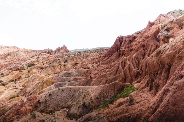 Skazka (Fairy Tale) Canyon on Lake Issyk-Kul, Kyrgyzstan, red and yellow clay ridges