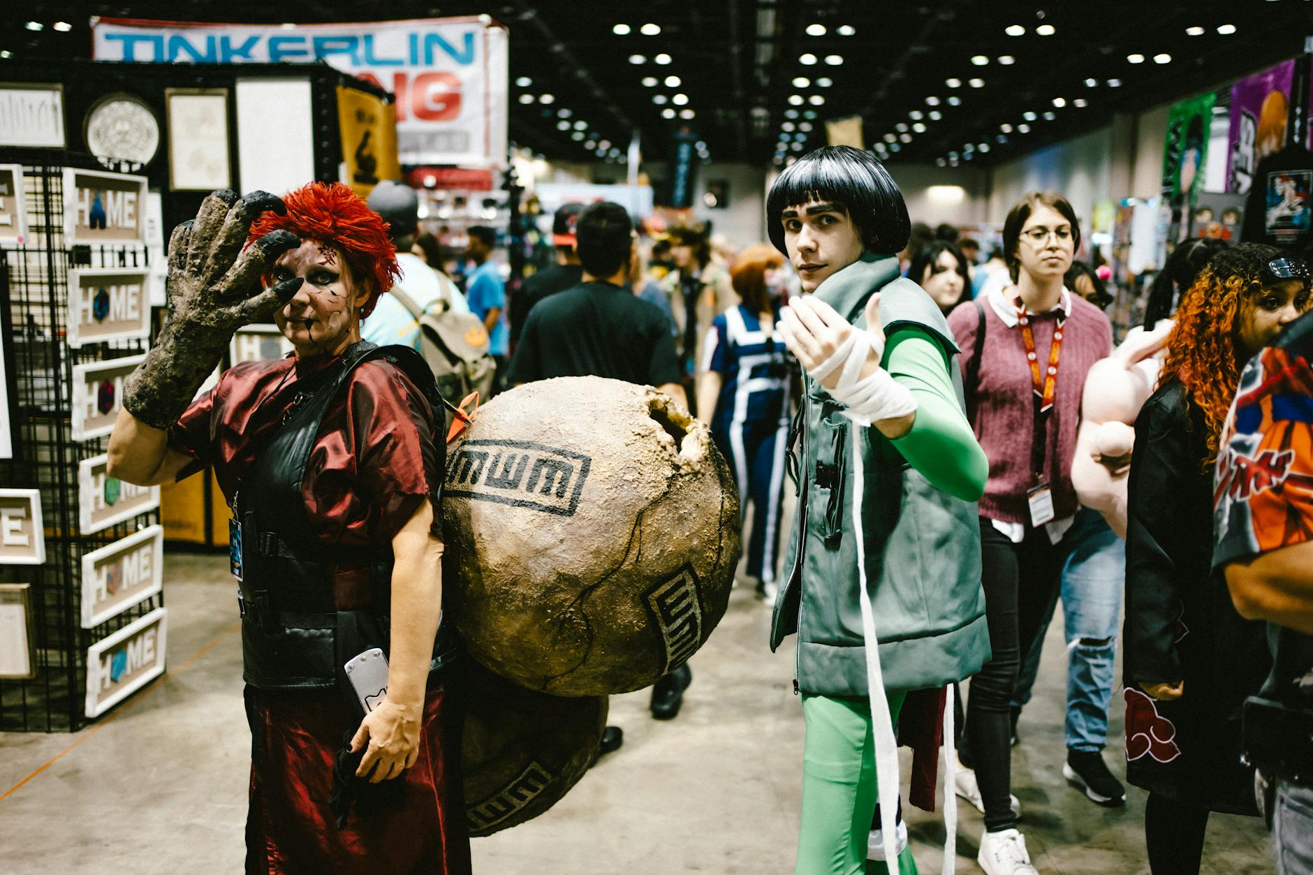 Two cosplayers at an anime convention