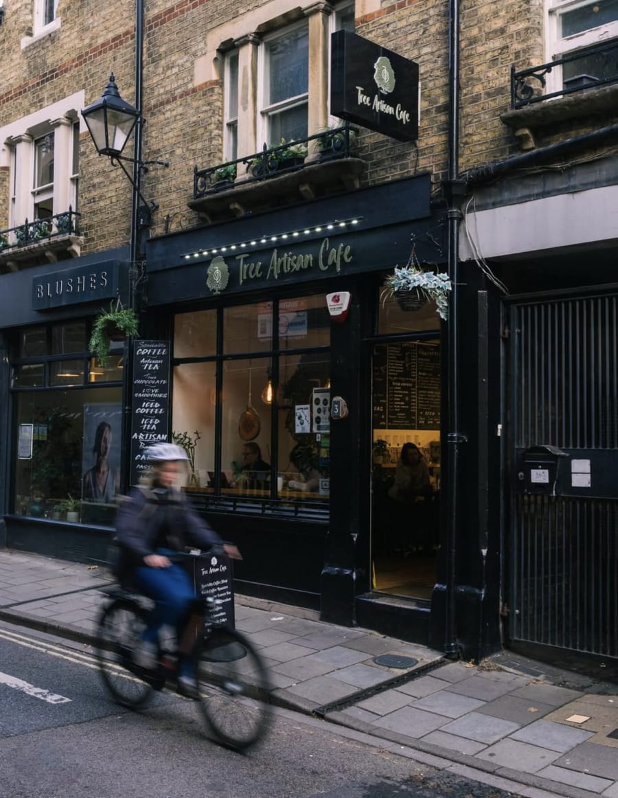 Tree Artisan Cafe storefront on Little Clarendon St, Oxford — black facade with hand-lettered sign