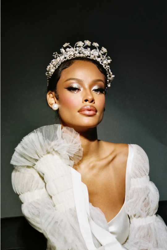 Pat McGrath Labs model wearing a tiara in a campaign shot