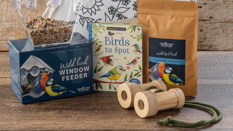 Junior bird explorer kit with window feeder, bird spotting book, bird food and wooden binoculars