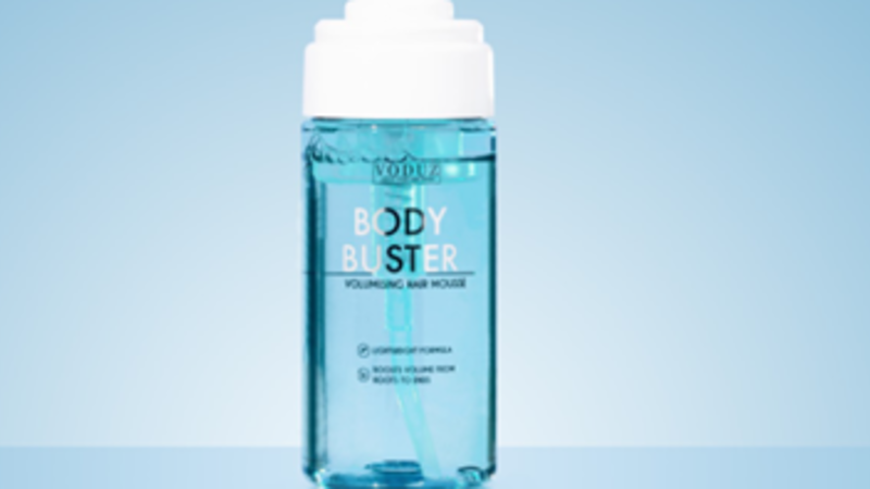 Voduz Body Buster Volumising Hair Mousse in clear blue bottle with white pump cap