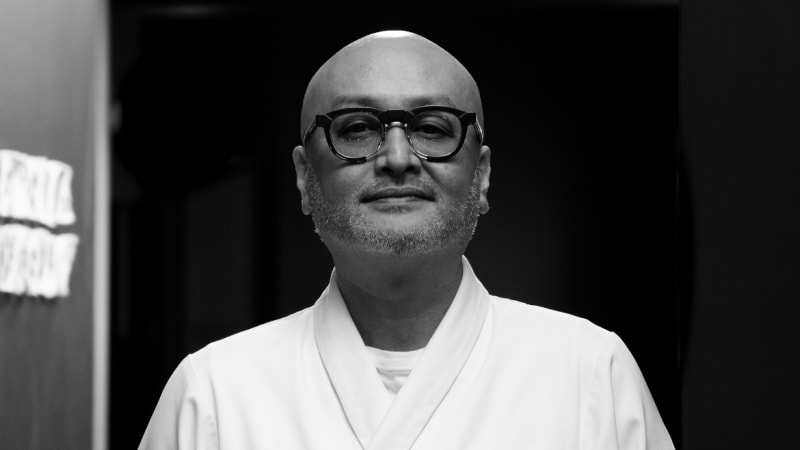 Takashi Miyazaki of Ichigo Ichie, bald chef with glasses wearing white jacket