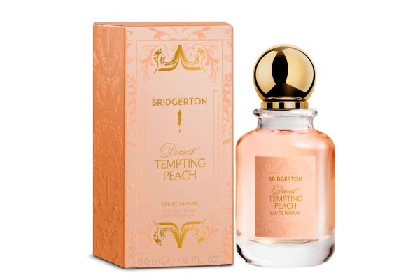 Bridgerton Dearest Tempting Peach Eau de Parfum bottle and box in peach with gold accents