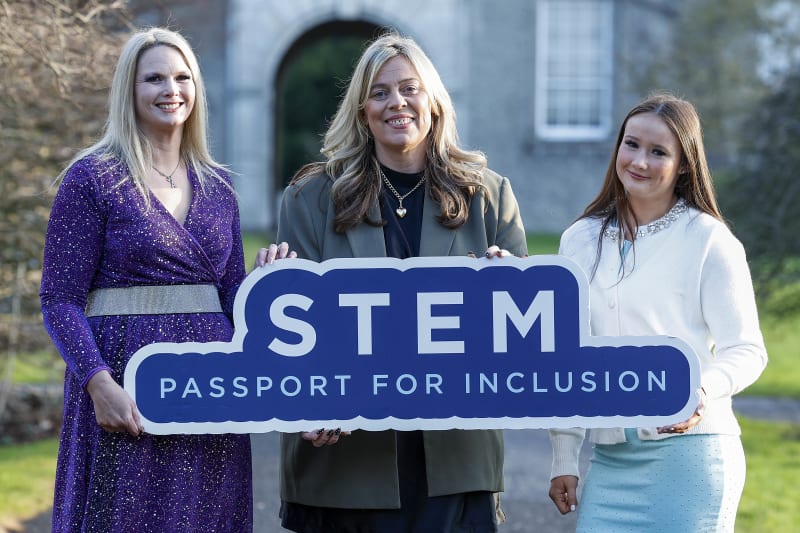 Avril Hannifin, Professor Katriona O'Sullivan, and Dionne Hannifin-Daly holding STEM Passport for Inclusion sign