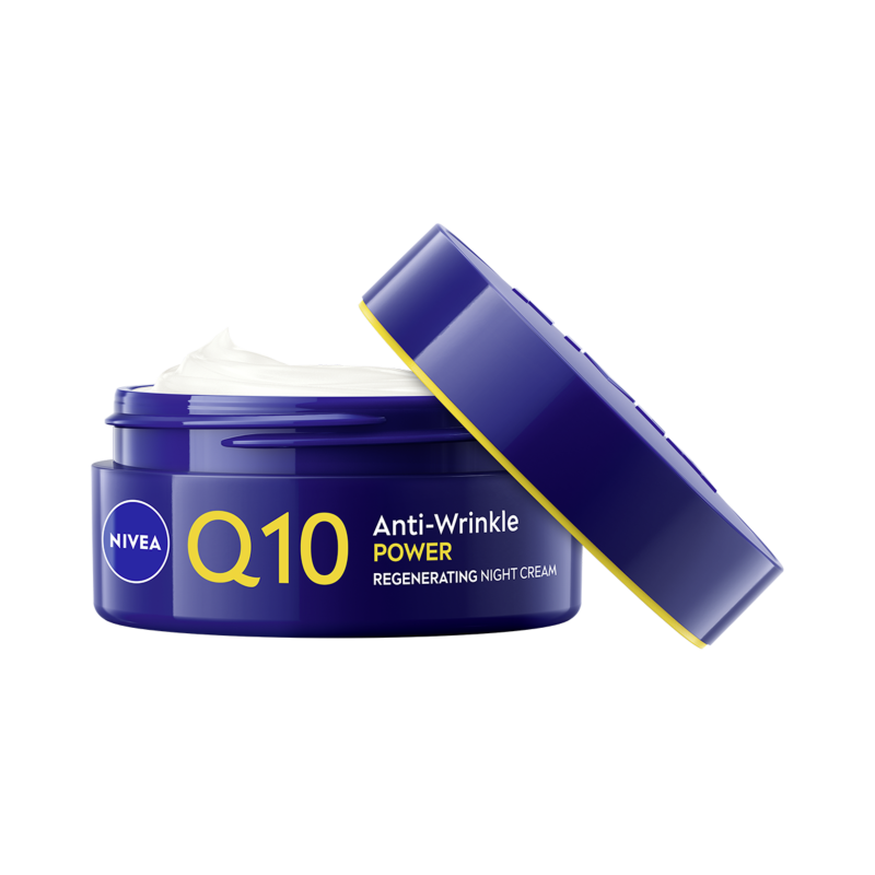 Nivea Q10 Anti-Wrinkle Power Regenerating Night Cream in dark blue jar with lid off showing white cream