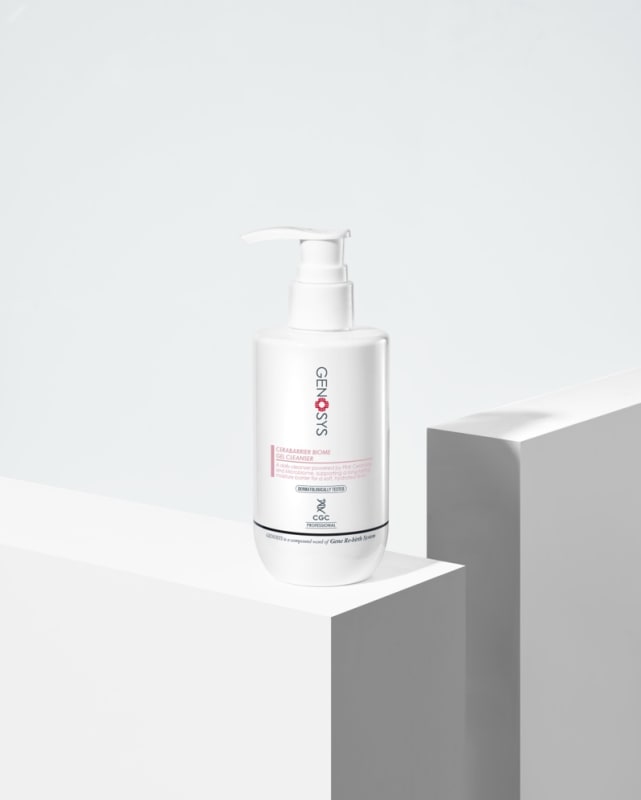 Genosys CeraBarrier Biome Gel Cleanser white pump bottle on white geometric plinth, studio shot.