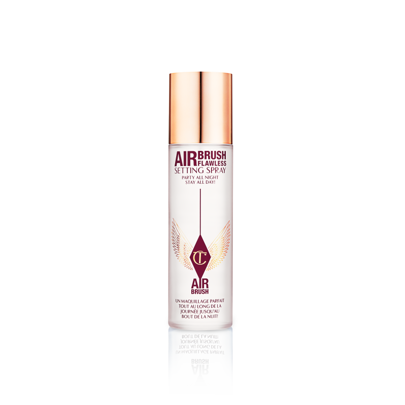 Charlotte Tilbury Airbrush Flawless Setting Spray in a frosted bottle with rose gold cap and winged CT logo.