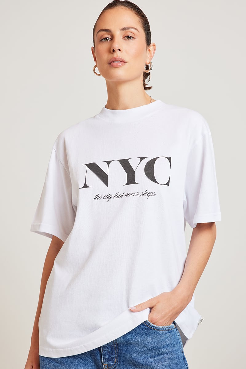 Araminta James City Never Sleeps Tee Background Image