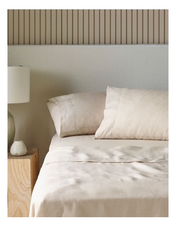 Sandy Cape Washed Belgian Linen Sheet Set in Moonbeam Background Image