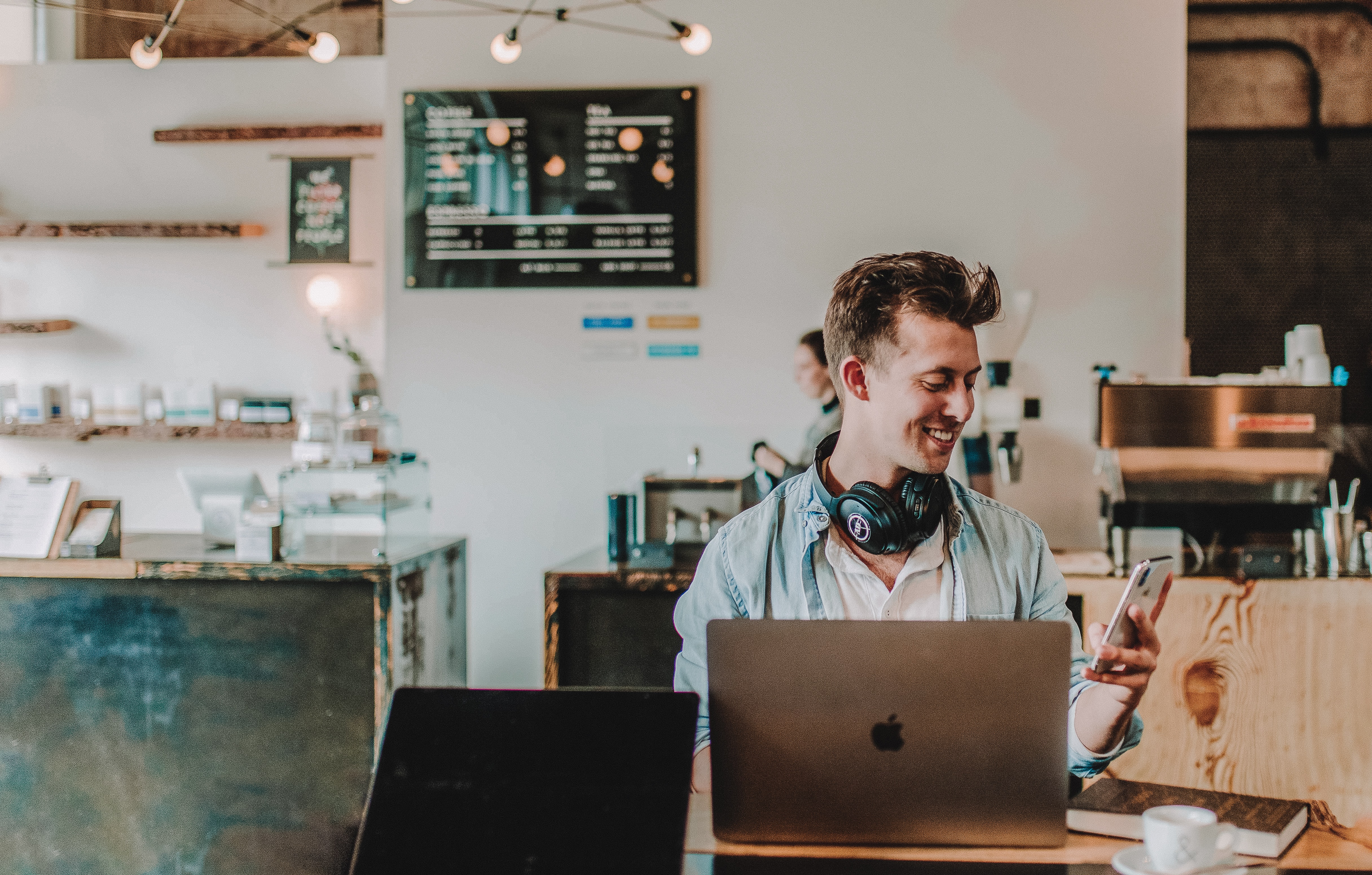 person having fun on a cafe while he is sharing his favorite Genzers to rise podcast