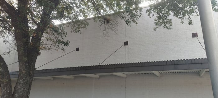 Commercial wall after pressure washing