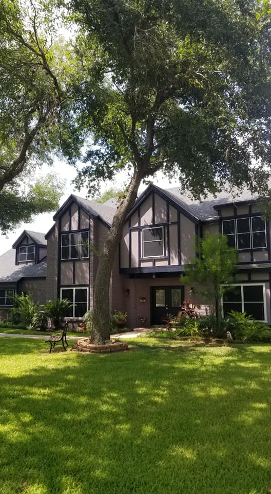 Two-Story Grey Home after solar screens
