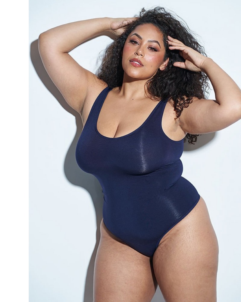 Front of a model wearing a size 1X BODYSUIT in Midnight Navy by MINDD. | dia_product_style_image_id:239311