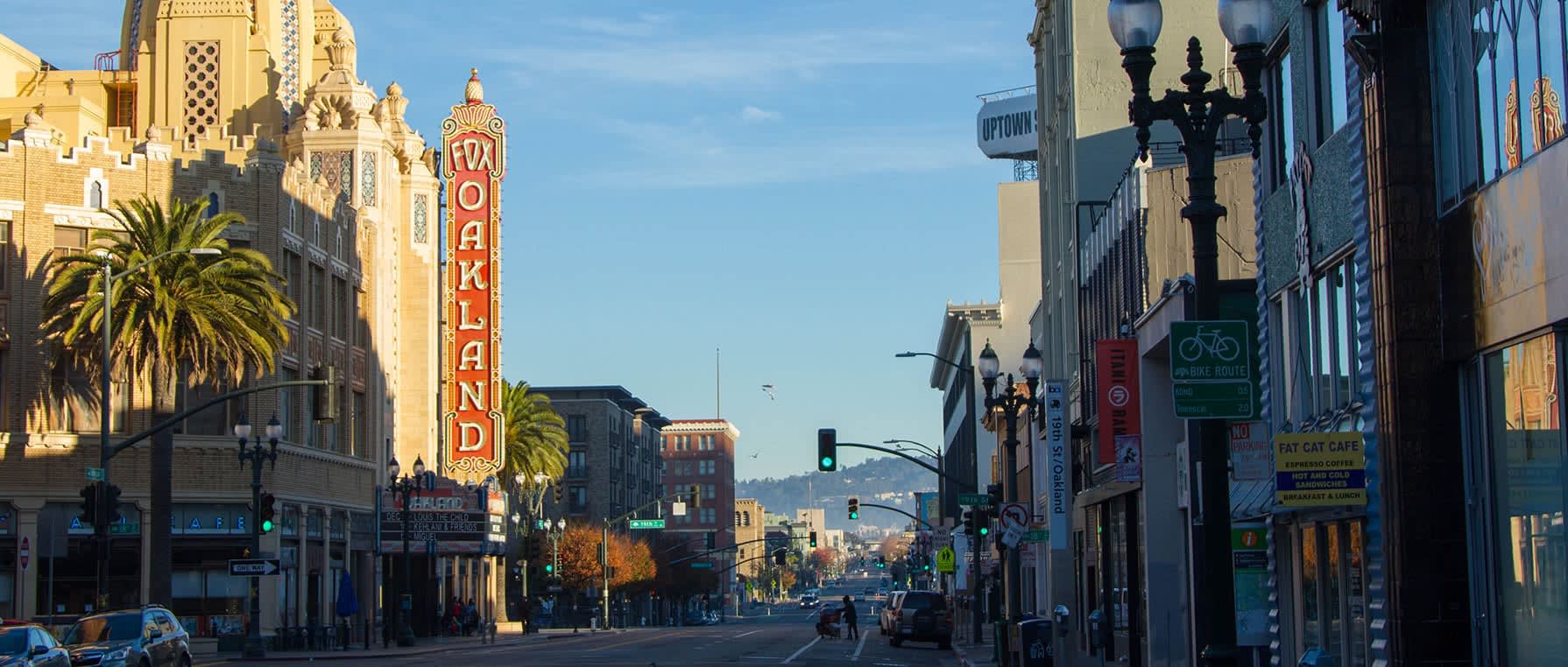 Downtown Oakland street showing the sign for the Fox Oakland theater. 