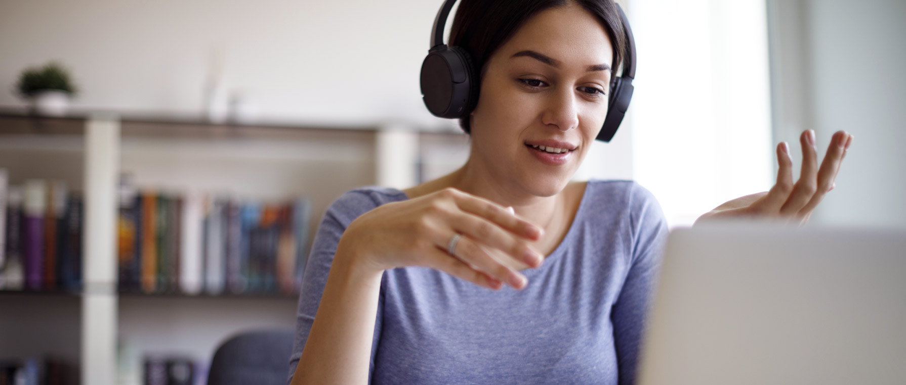 Woman on video chat at home on laptop