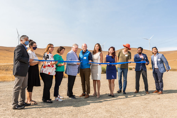 Photo of ribbon cutting event at New Scott Haggerty Wind Energy Center