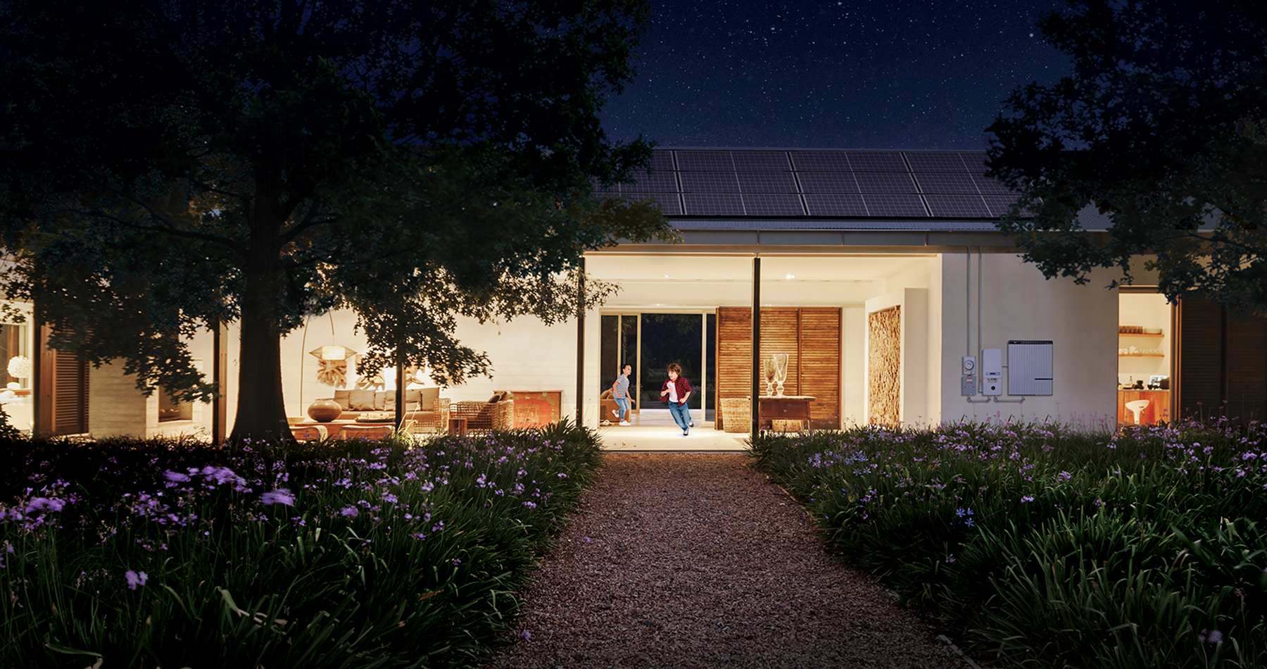 Two children playing in a house light up at night