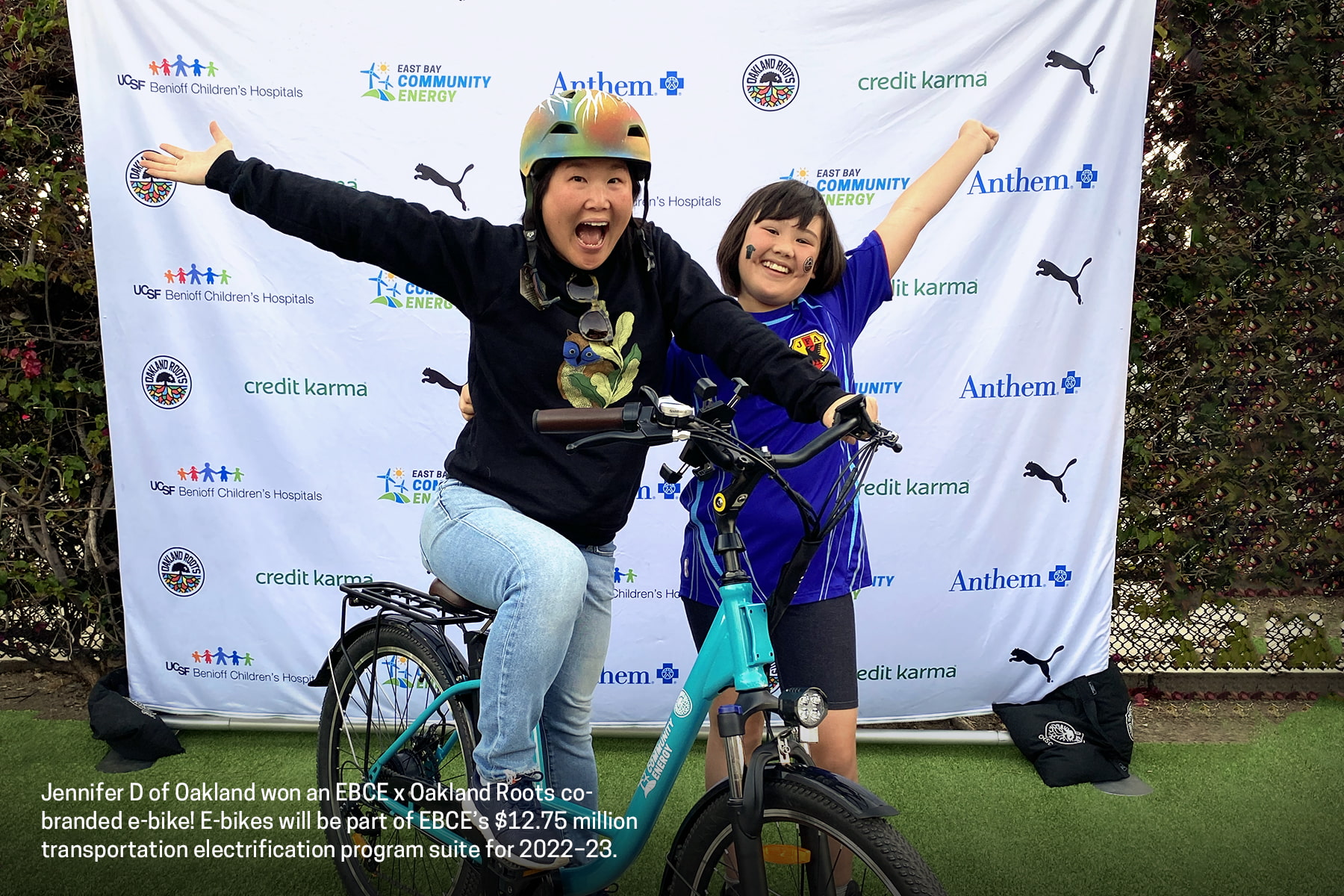 Jennifer D of Oakland and her daughter with EBCE branded e-bike