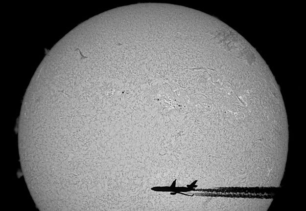 An Airplane in Front of the Sun