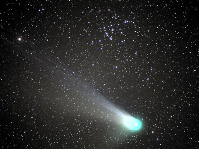 Comet NEAT and the Beehive Cluster