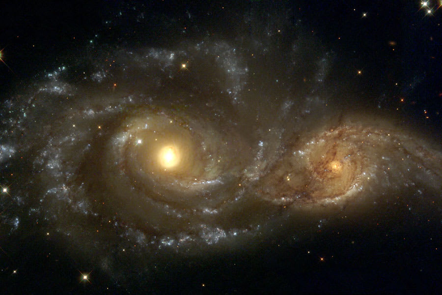Spiral Galaxies in Collision