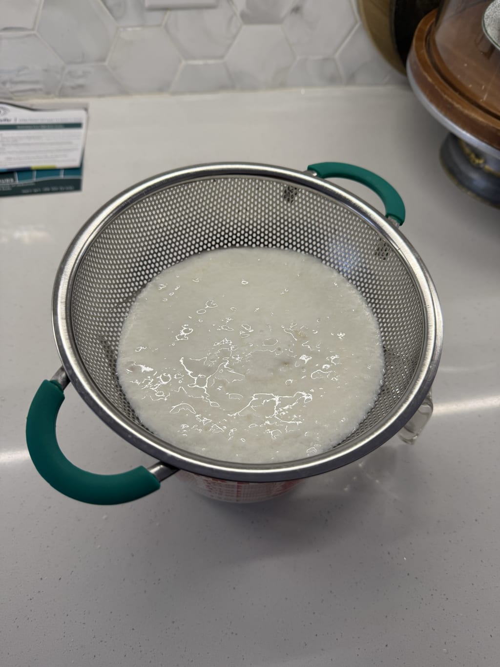 Straining it to catch any grains that are floating.