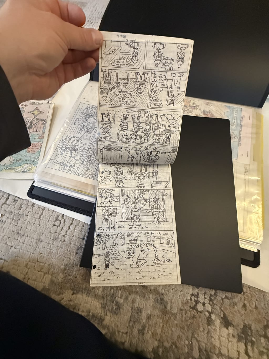 Look at the density of these comic book page drawings.  :). A little dizzying, yet intriguing. 