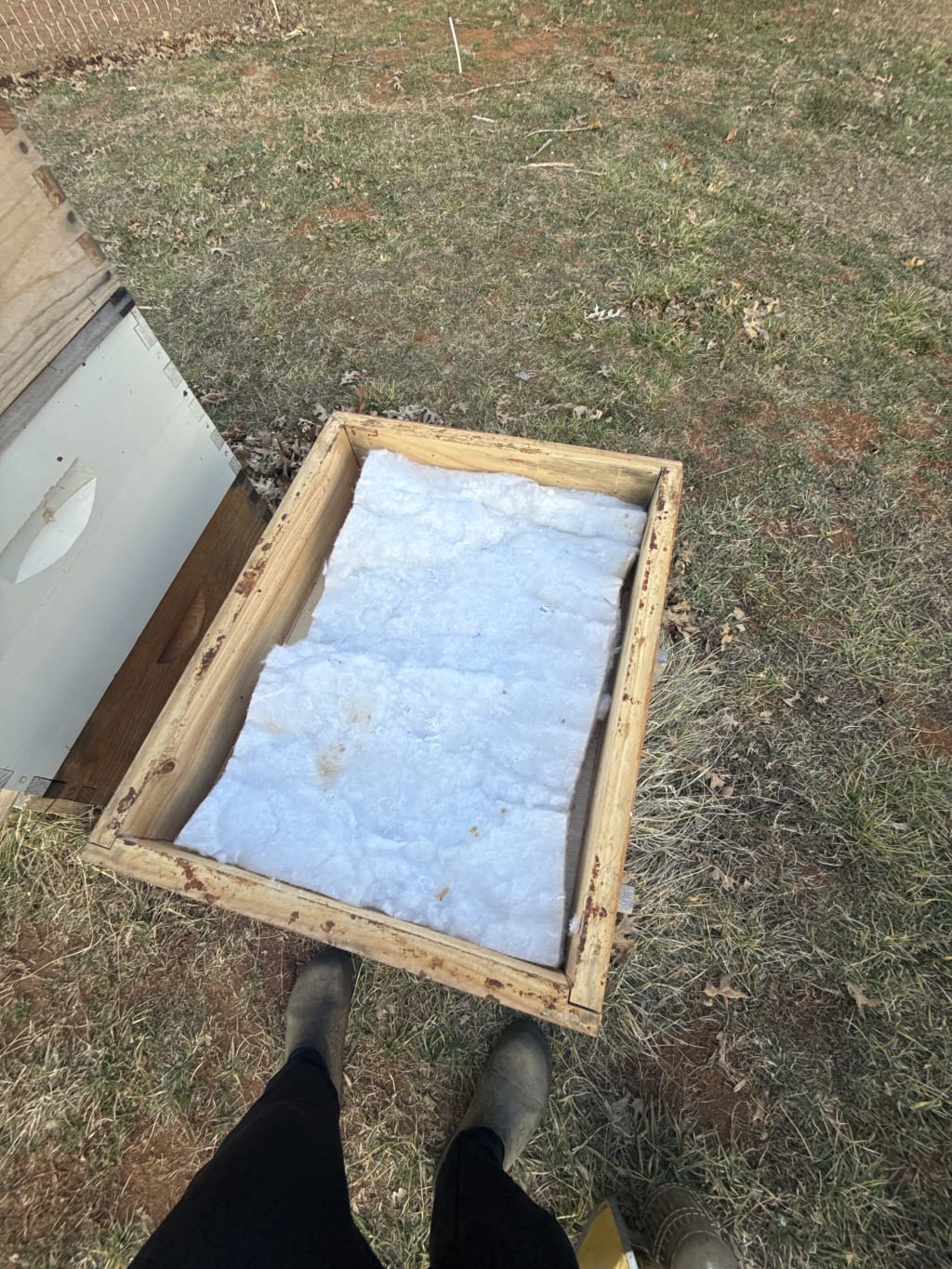 I always add a layer of insulation at the very top of the hive, above the inner cover.  Sometimes I use a shallow box or a feeding shim to put it in.
