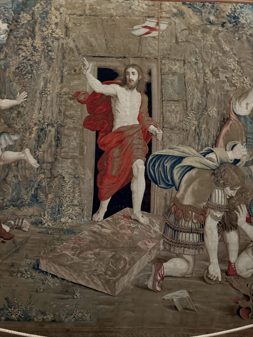 A detailed tapestry depicting the resurrection of Jesus Christ from the tomb.