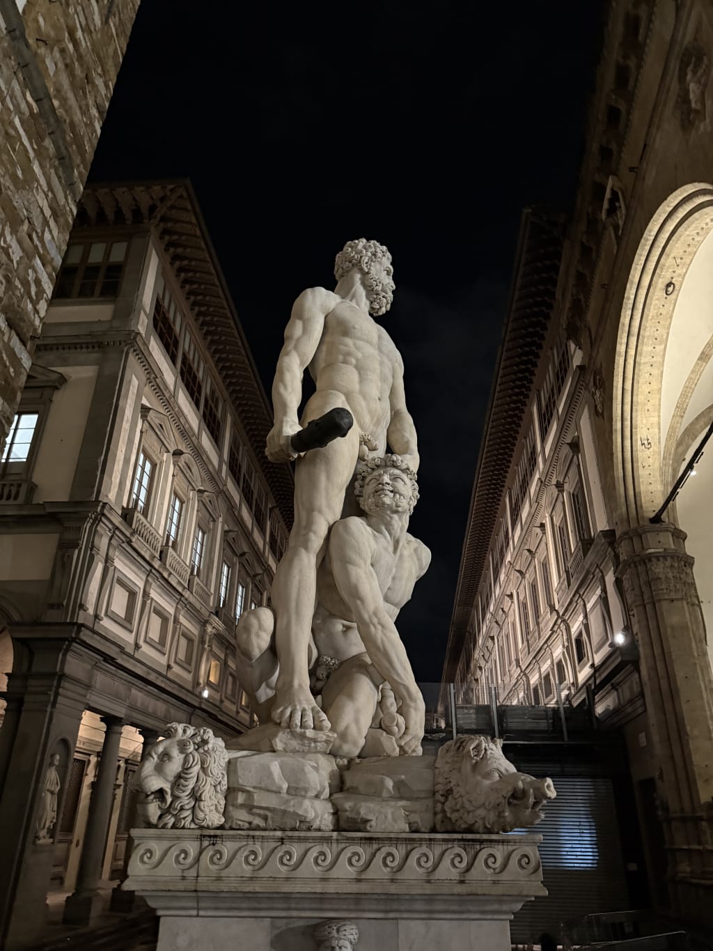 Night view of the famous marble statue "Hercules and Cacus" in Florence, Italy.