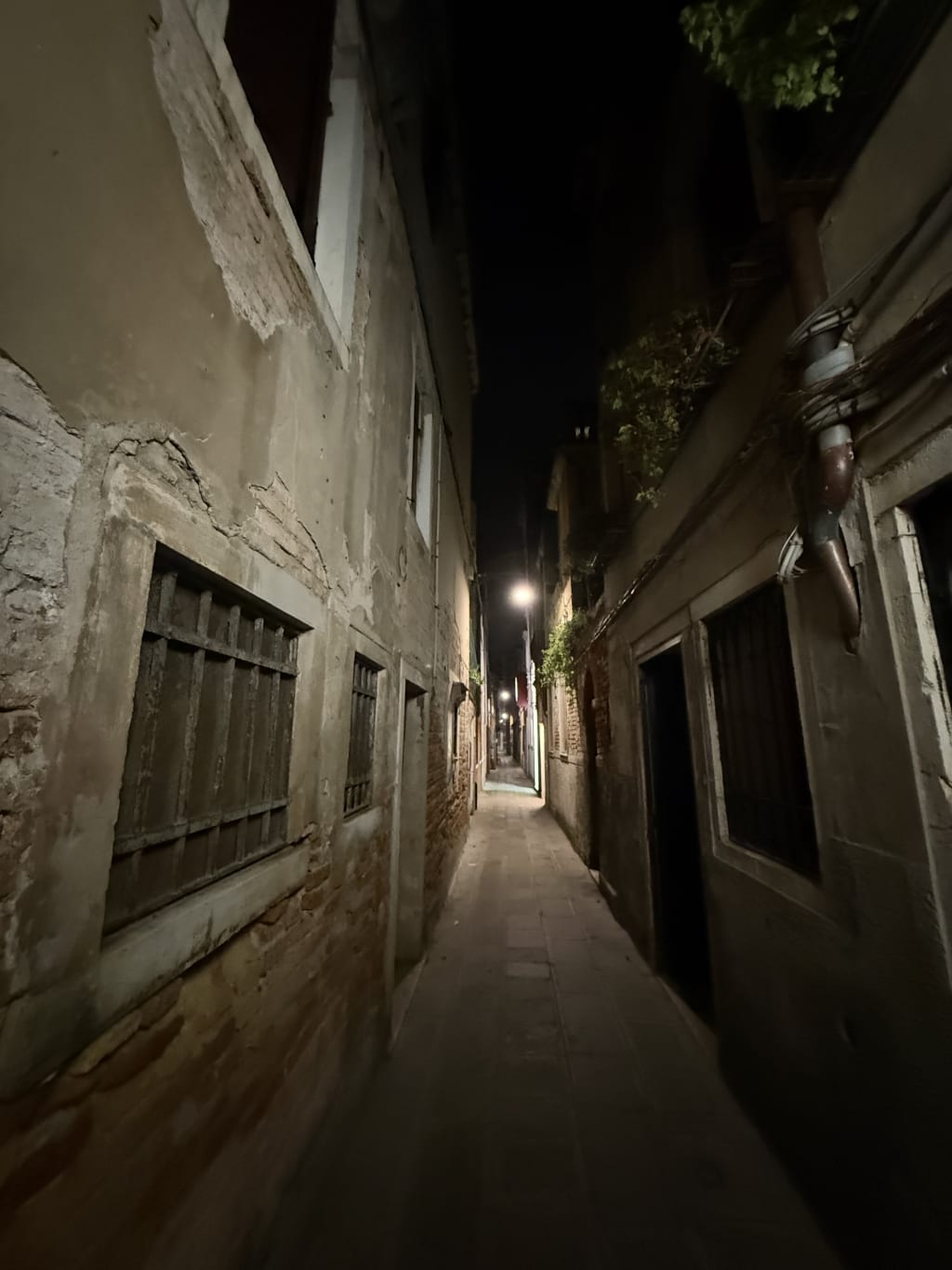 Had to go back to the airport at night, by myself, and walked through the town on lots of dark long alleys like these.