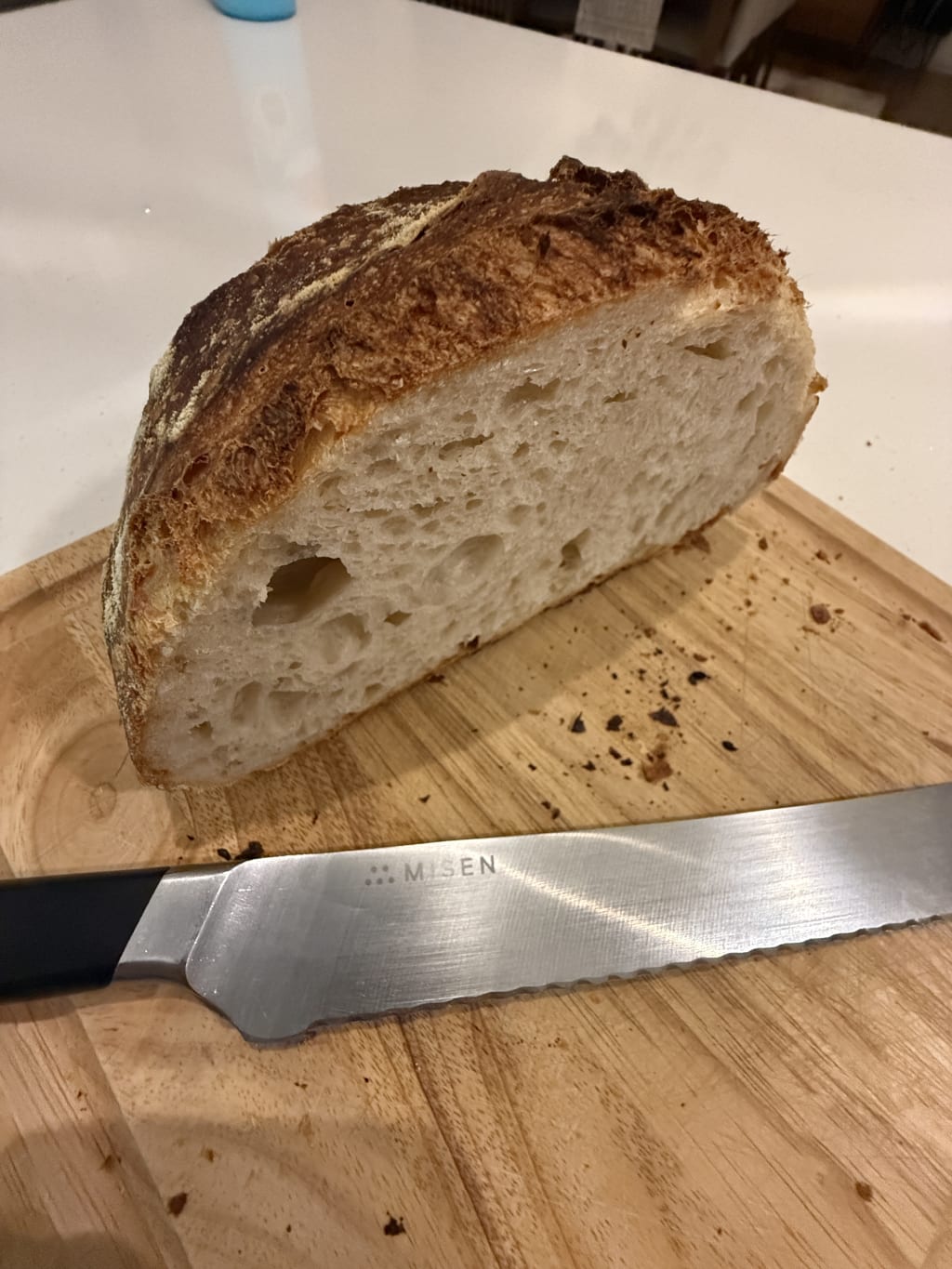 This Misen knife is a great companion and the first tool to touch the bread after it cools off and is ready to eat.
