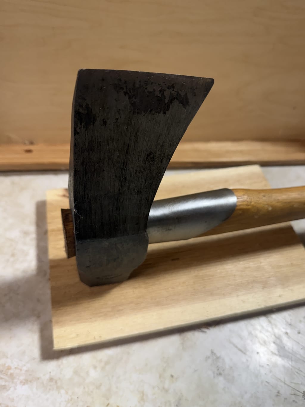 I really love the shape of this axe.  The metal guard is a very nice touch also.