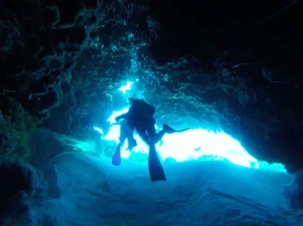 Swimming through an underwater tunnel