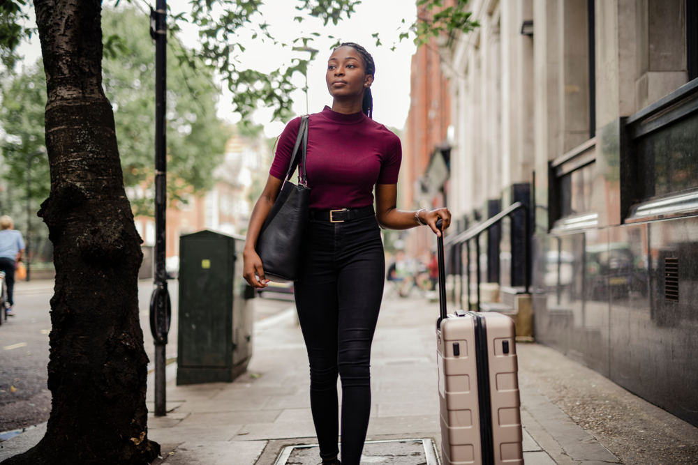 Female tourist looking smart and confident, on a vacation - travel safety tips